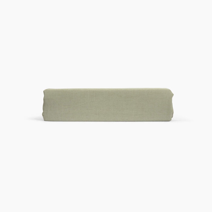 Avec linen classic top sheet in sage folded neatly on a white background