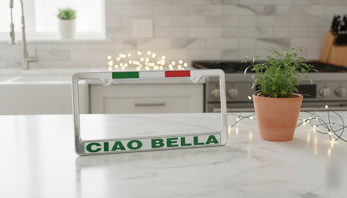 License plate frame with 'CIAO BELLA' text on a kitchen counter.