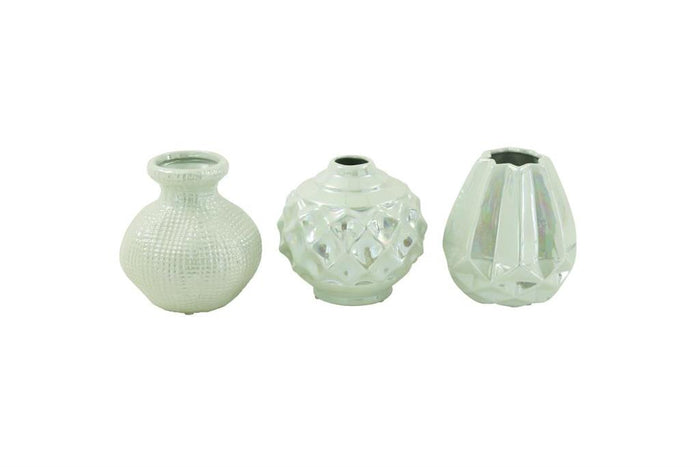 COSMOPOLITAN CREAM CERAMIC VASE WITH VARYING PATTERNS