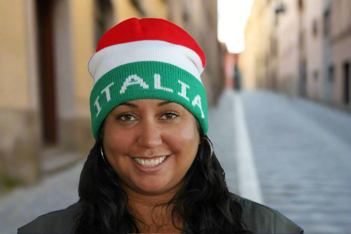 Person wearing a red, white, and green beanie with 'ITALIA' text on a white background