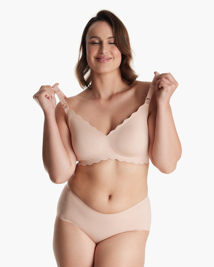 Smiling woman models beige Jelly Strip Seamless Nursing Bra YN46 set with matching scalloped briefs, optimized for M9 Pump.
