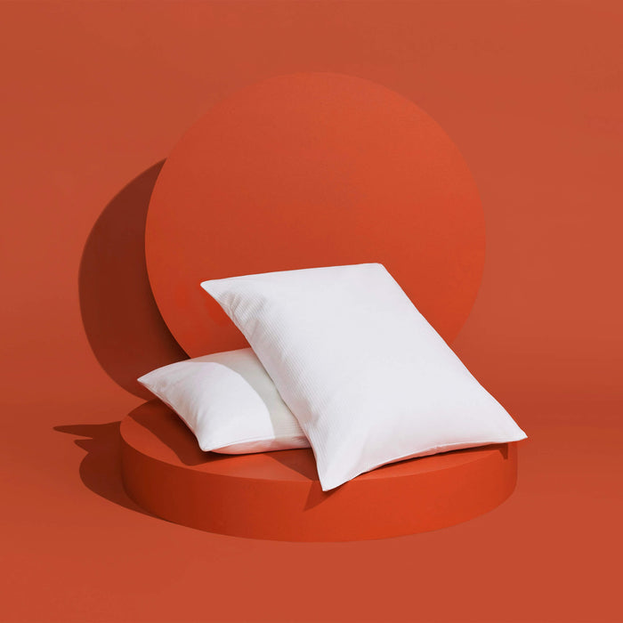 The Slumber Cloud Performance Pillow Cover made with Outlast® temperature regulation technology and Tencel to help you stay cool through the night.