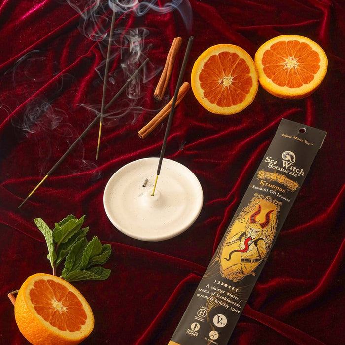 Forager Provisions LTD Sea Witch Botanicals Krampus incense sticks with orange slices, cinnamon, and mint on velvet.