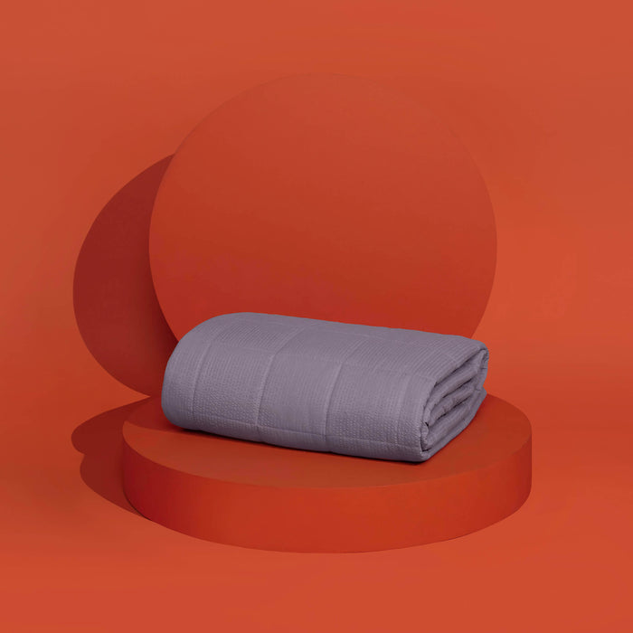 The Slumber Cloud Textured Blanket in Pewter made with Outlast Temperature Regulation Technology